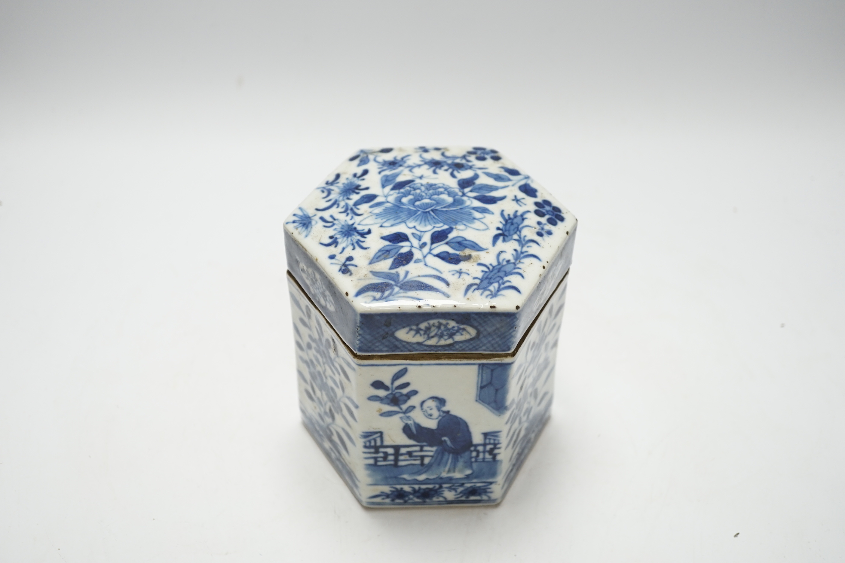 A late 19th century Chinese blue and white hexagonal jar and cover, 14cm